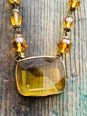 Antique Czechoslovakian Citrine Crystal Necklace with large Brass set center faceted stone and faceted crystal beads