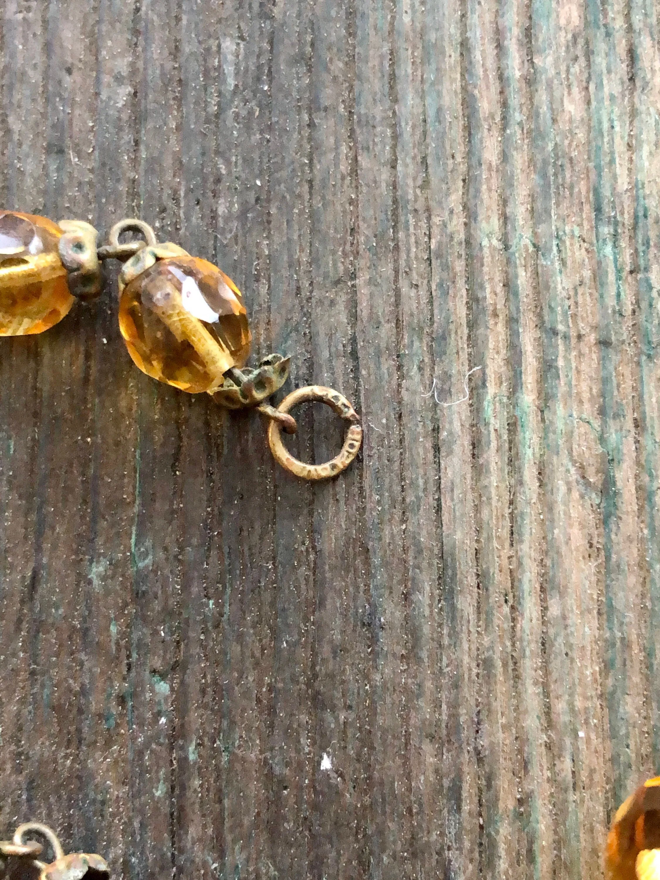 Antique Czechoslovakian Citrine Crystal Necklace with large Brass set center faceted stone and faceted crystal beads