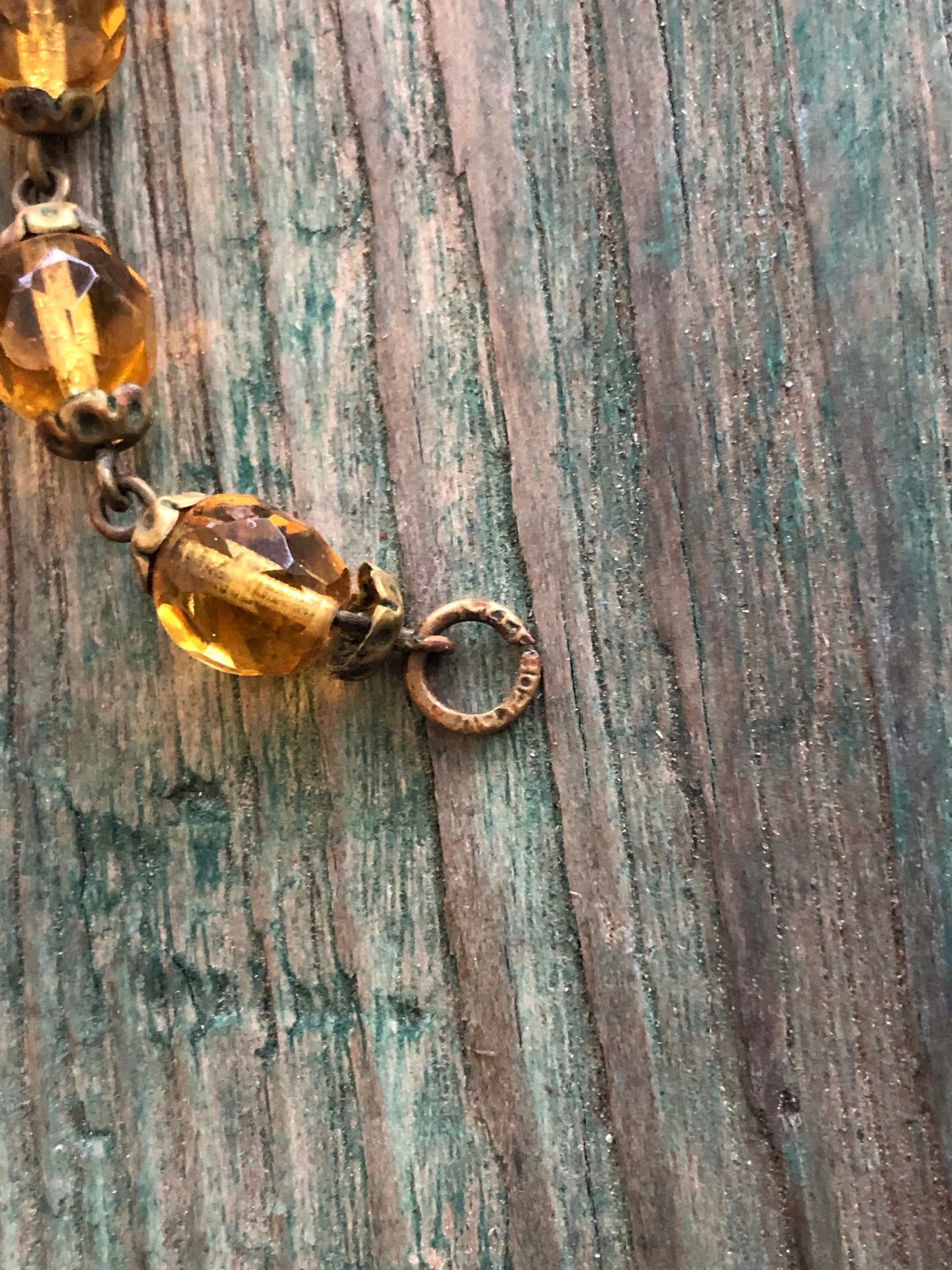 Antique Czechoslovakian Citrine Crystal Necklace with large Brass set center faceted stone and faceted crystal beads