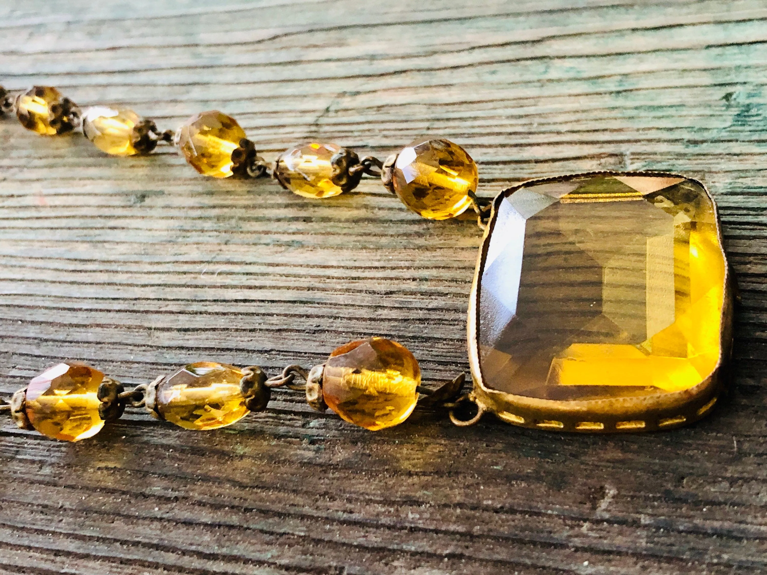 Antique Czechoslovakian Citrine Crystal Necklace with large Brass set center faceted stone and faceted crystal beads