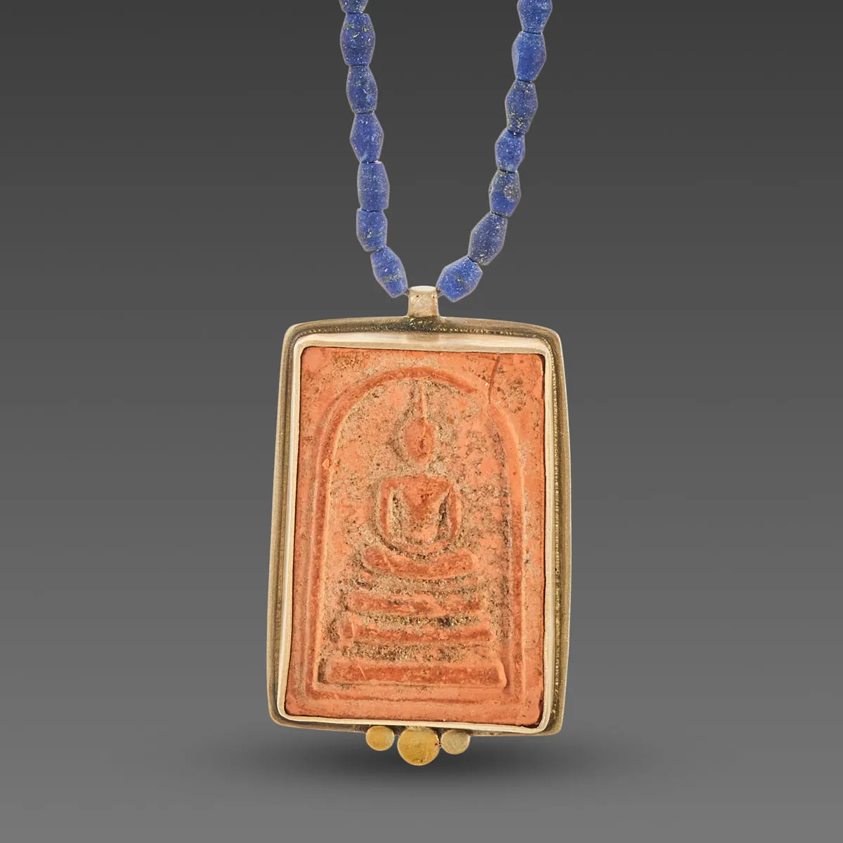 Buddha Amulet on Lapis Strand