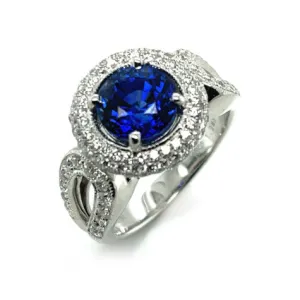GIA Certified 3.29 Carat Round Blue Sapphire and Diamond Halo Ring in White Gold